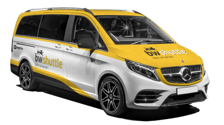 Kleinbus des bwShuttle - gelb-weißer Mercedes-Kleinbus mit den Logo des bwShuttle - das Bild mit mit Klick vergrößert
