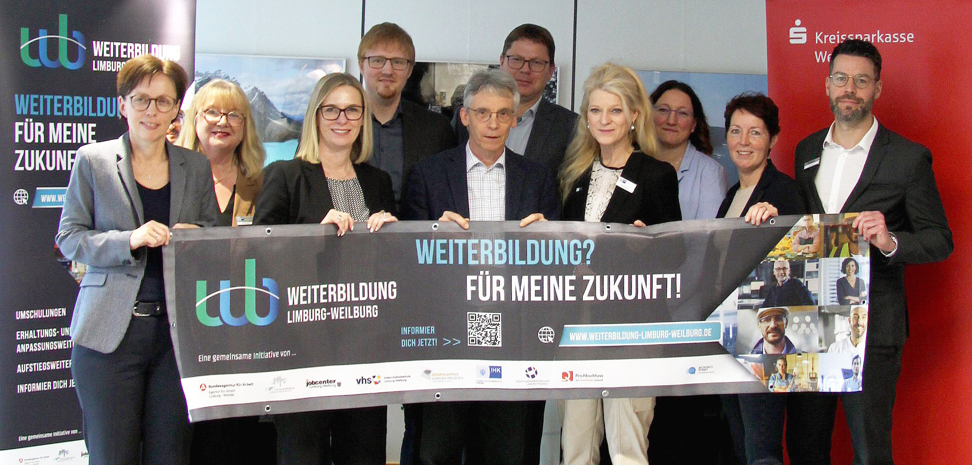 Gruppenfoto mit Banner: wfg weiterbildung limburg weilburg