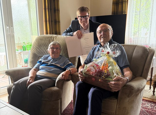 Helga und Richard Rebmann mit Oberbürgermeister Markus Kleemann